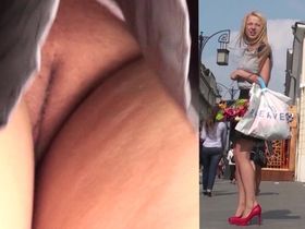 Девушка в красным туфлях и короткой кожаной юбке попалась на камеру